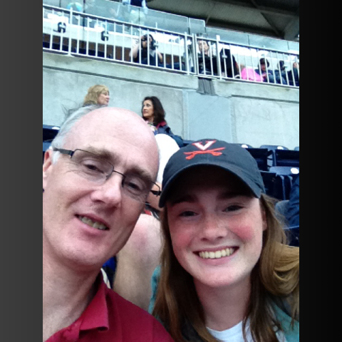 Hannah and John at a baseball game